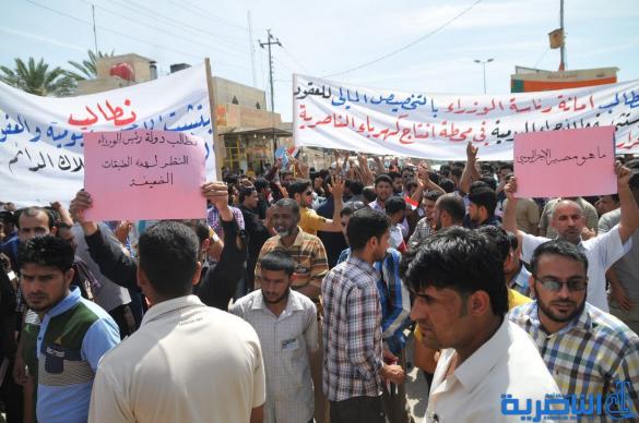موظفو العقود في كهرباء ذي قار يتظاهرون للمطالبة بتثبيتهم على الملاك الدائم - تقرير مصور -