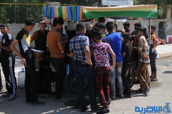 بالصور:احتفال ابناء الناصرية بعيد الفطر المبارك