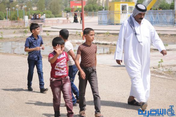 بالصور:احتفال ابناء الناصرية بعيد الفطر المبارك