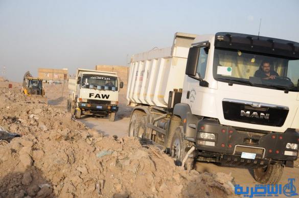 بالصور : الناصرية لن تبقى بانتظار موازنة بغداد ، وتباشر تاهيل شوارعها بجهد ذاتي