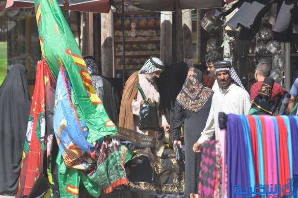  بالصور : الناصرية تتشح بالسواد في عزاء سيد الشهداء