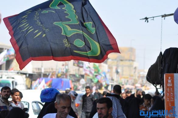 بالصور : الناصرية تتشح بالسواد في عزاء سيد الشهداء