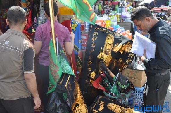  بالصور : الناصرية تتشح بالسواد في عزاء سيد الشهداء