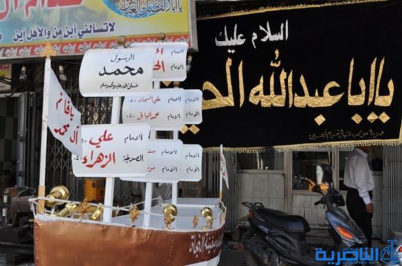  بالصور : الناصرية تتشح بالسواد في عزاء سيد الشهداء