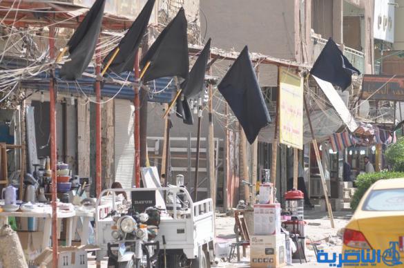  بالصور : الناصرية تتشح بالسواد في عزاء سيد الشهداء