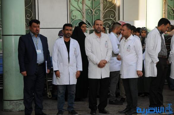 الممرضون في الناصرية ينظمون وقفة احتجاجية ضد اعتداءات المراجعين - تقرير مصور -