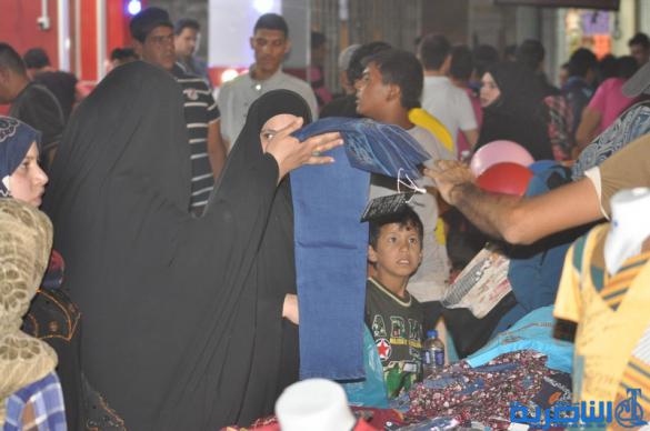بالصور : اسواق الناصرية لا تنام الليل ، ودكاكينها عامرة بهدايا العيد