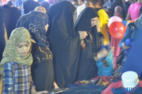 بالصور : اسواق الناصرية لا تنام الليل ، ودكاكينها عامرة بهدايا العيد