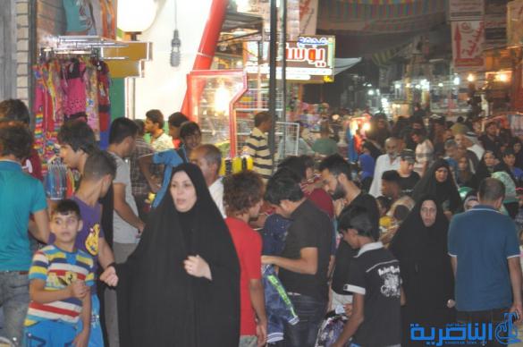 بالصور : اسواق الناصرية لا تنام الليل ، ودكاكينها عامرة بهدايا العيد