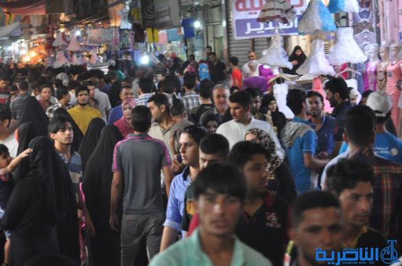 بالصور : اسواق الناصرية لا تنام الليل ، ودكاكينها عامرة بهدايا العيد