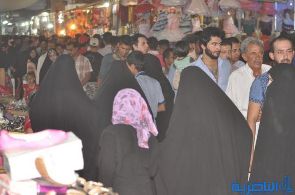 بالصور : اسواق الناصرية لا تنام الليل ، ودكاكينها عامرة بهدايا العيد