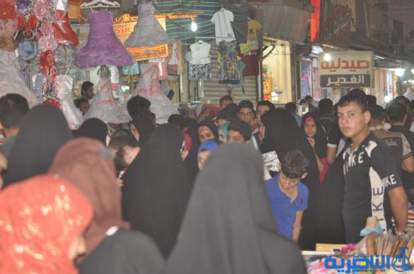 بالصور : اسواق الناصرية لا تنام الليل ، ودكاكينها عامرة بهدايا العيد