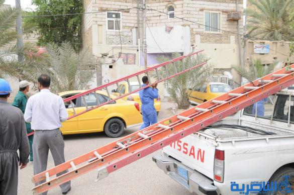 كهرباء ذي قار تنفذ حملة واسعة لرفع التجاوزات عن الشبكة الوطنية - تقرير مصور -