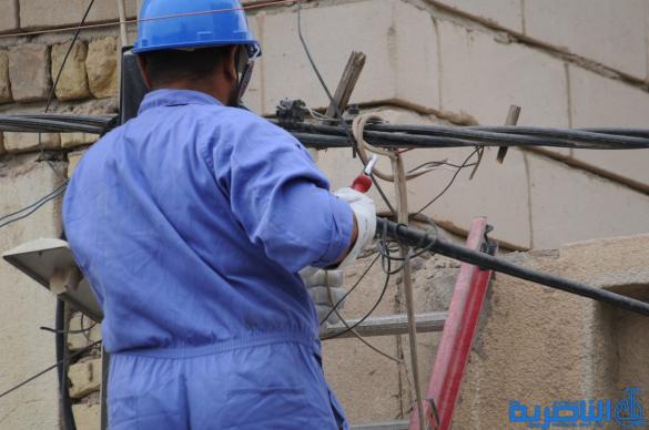كهرباء ذي قار تنفذ حملة واسعة لرفع التجاوزات عن الشبكة الوطنية - تقرير مصور -