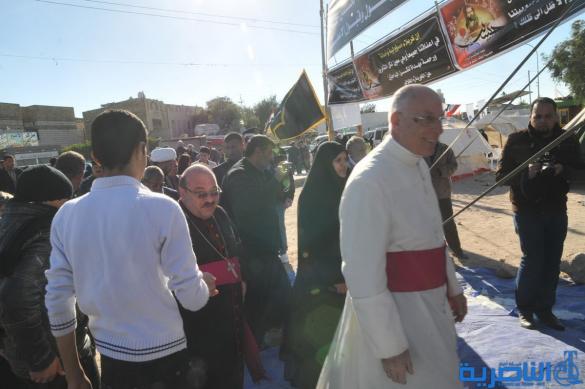 مسيحيو الفاتيكان يشاركون شيعة الناصرية مسيرهم نحو أربعينية الحسين - تقرير مصور -