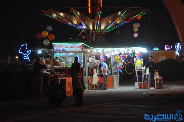 بالصور:فرحة العيد مرتسمة على وجوه العوائل في الناصرية