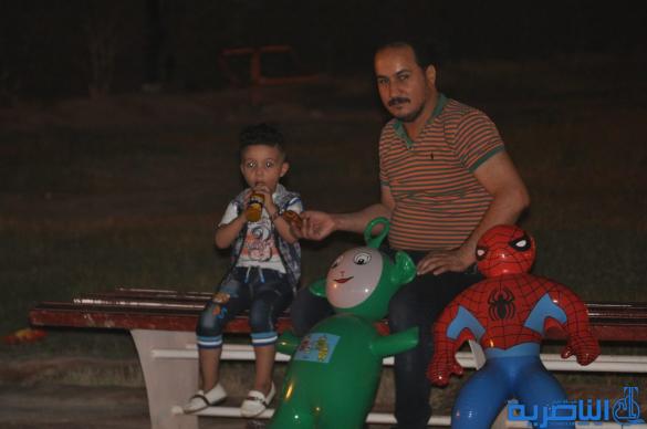 بالصور:فرحة العيد مرتسمة على وجوه العوائل في الناصرية