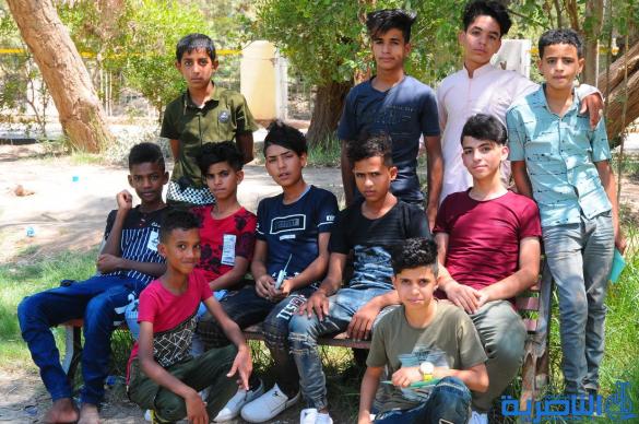 بالصور:اطفال الناصرية يقضون اول ايام عيد الفطر بالساحات والمتنزهات العامة