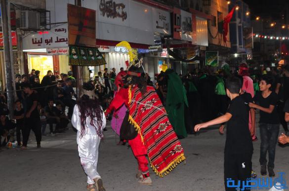 بالصور:مسير المواكب الحسينية وسط الناصرية في ليلة السابع من المحرم 