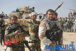 بالصور.. غبار الأرض وأعمدة الدخان تمد ظلاً فوق المقاتلين في صلاح الدين