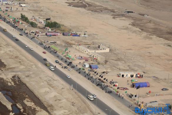 بعدسة شبكة اخبار الناصرية:صور جوية لجموع الزوار على درب الحسين