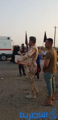 بالصور:موكب حسيني لقاعدة الامام علي الجوية خدمة لزوار الاربعين 