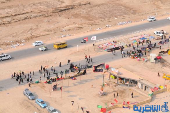 بعدسة شبكة اخبار الناصرية:صور جوية لجموع الزوار على درب الحسين