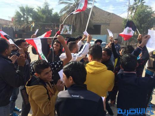  بالصور : رياضيون يتظاهرون في الناصرية ويهتفون ( الملاعب خط احمر )