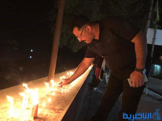 بالصور:ابناء قلعة سكر يوقدون الشموع استذكارا لضحايا حادثة الموصل