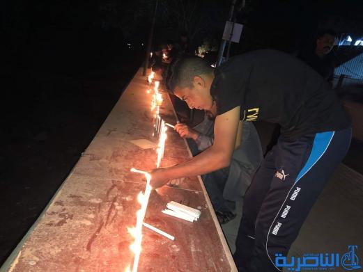 بالصور:ابناء قلعة سكر يوقدون الشموع استذكارا لضحايا حادثة الموصل