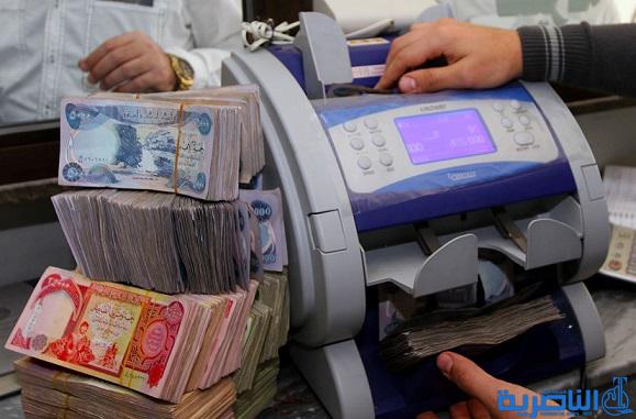  ذي قار توزع مبالغ بدل البطاقة التموينية عن الاشهر الاخيرة من العام 2014