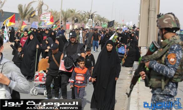  بالصور.. يدٌ تطعم وأخرى تحمي الزائرين الوافدين على كربلاء