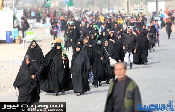  بالصور.. يدٌ تطعم وأخرى تحمي الزائرين الوافدين على كربلاء
