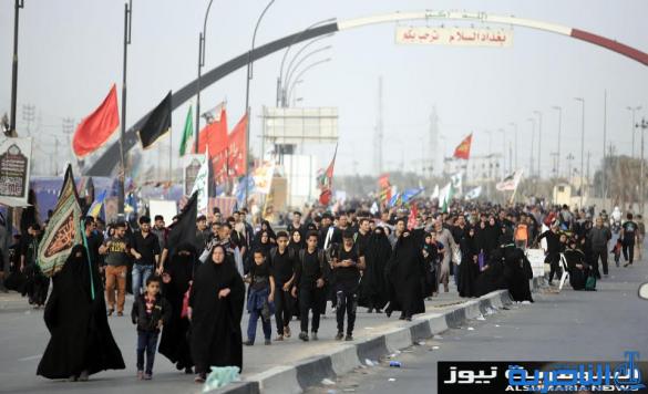  بالصور.. يدٌ تطعم وأخرى تحمي الزائرين الوافدين على كربلاء