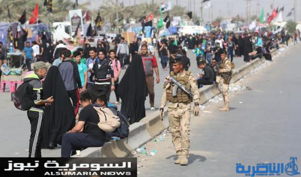  بالصور.. يدٌ تطعم وأخرى تحمي الزائرين الوافدين على كربلاء