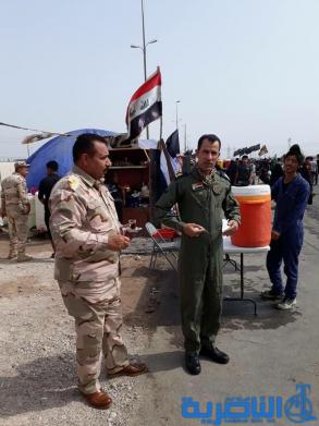 بالصور:موكب حسيني لقاعدة الامام علي الجوية خدمة لزوار الاربعين 