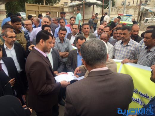  المشرفون التربوين في الناصرية يتظاهرون للمطالبة بمخصصات النقل - تقرير مصور -