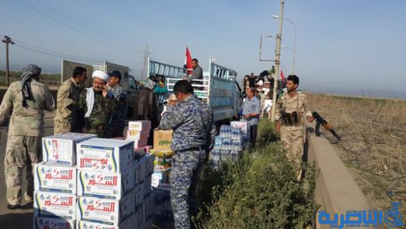 بالصور :الرفاعي ترسل مائة طن من الاغذية الى الحشد الشعبي في صلاح الدين