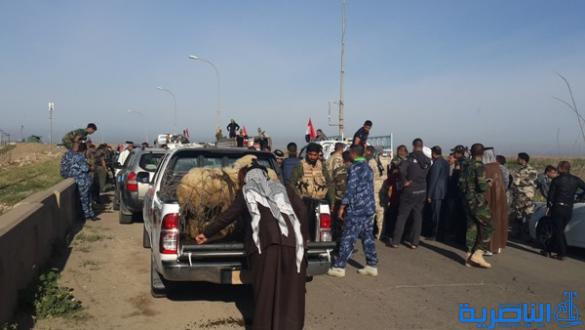 بالصور :الرفاعي ترسل مائة طن من الاغذية الى الحشد الشعبي في صلاح الدين