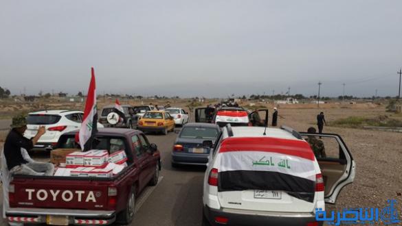 بالصور :الرفاعي ترسل مائة طن من الاغذية الى الحشد الشعبي في صلاح الدين