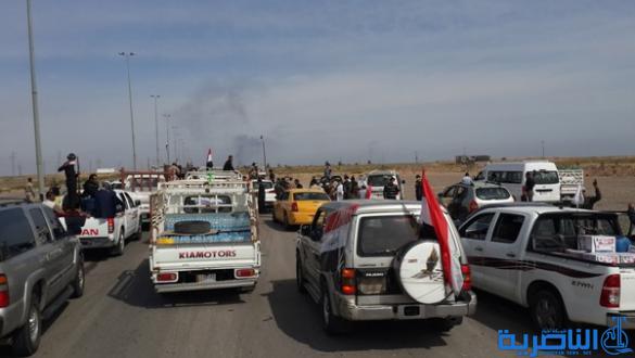 بالصور :الرفاعي ترسل مائة طن من الاغذية الى الحشد الشعبي في صلاح الدين