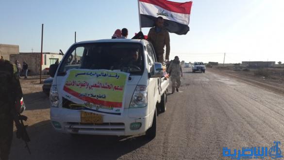 بالصور :الرفاعي ترسل مائة طن من الاغذية الى الحشد الشعبي في صلاح الدين