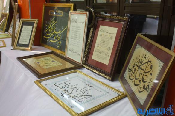 المركز الثقافي العراقي يقيم معرضا للخط والزخرفة في ذي قار - تقرير مصور -