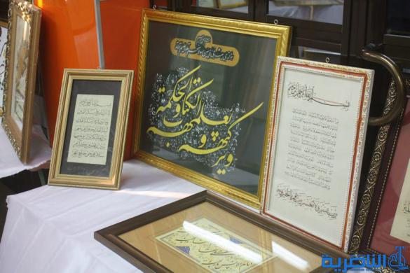 المركز الثقافي العراقي يقيم معرضا للخط والزخرفة في ذي قار - تقرير مصور -