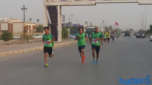مركز الناصرية للقلب يستثمر فرحة النصر في الموصل وينظم ركضة جماهيرية في الناصرية - تقرير مصور - 
