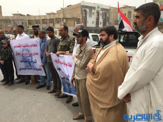 العشرات يتظاهرون في الناصرية للمطالبة باعدام الارهابيين في سجن الحوت - تقرير مصور-