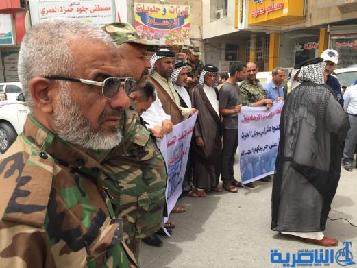 العشرات يتظاهرون في الناصرية للمطالبة باعدام الارهابيين في سجن الحوت - تقرير مصور-