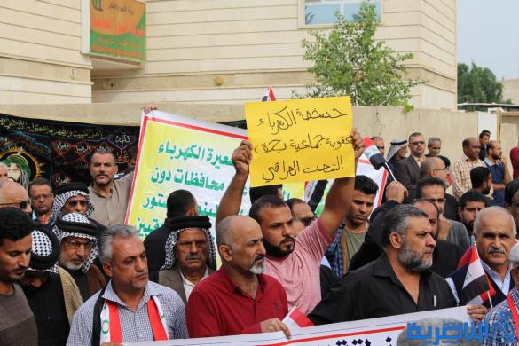 بالصور:تظاهرة الناصرية ضد مشروع خصخصة الكهرباء