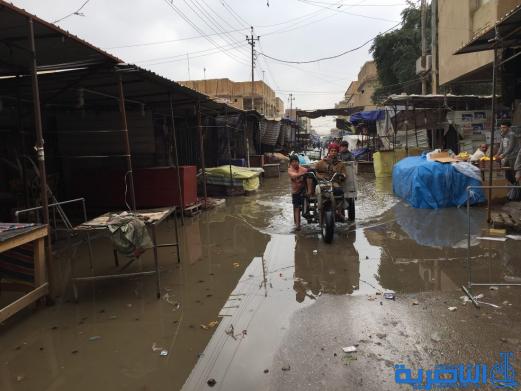 بالصور : الى بلدية الناصرية ، هذه شوارعكم بعد ليلة مطر واحدة