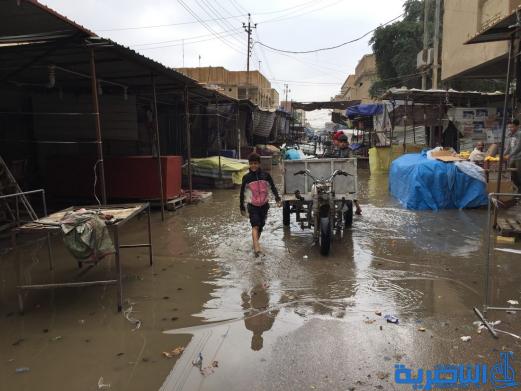 بالصور : الى بلدية الناصرية ، هذه شوارعكم بعد ليلة مطر واحدة